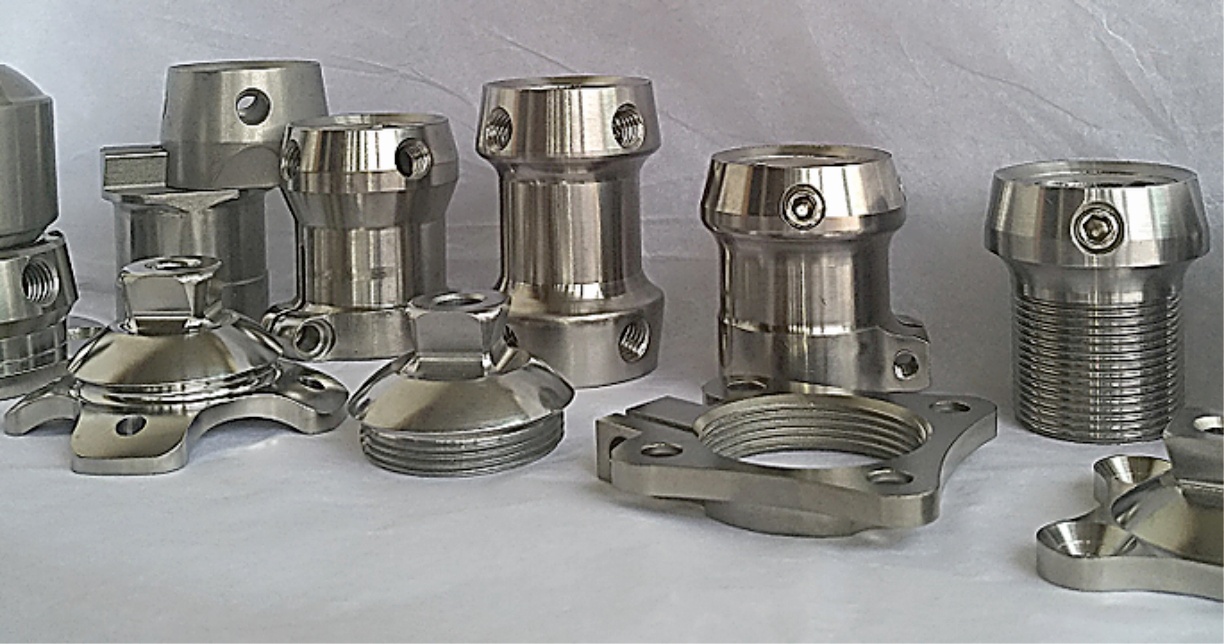 Prosthetic components for precision machining and titanium product applications