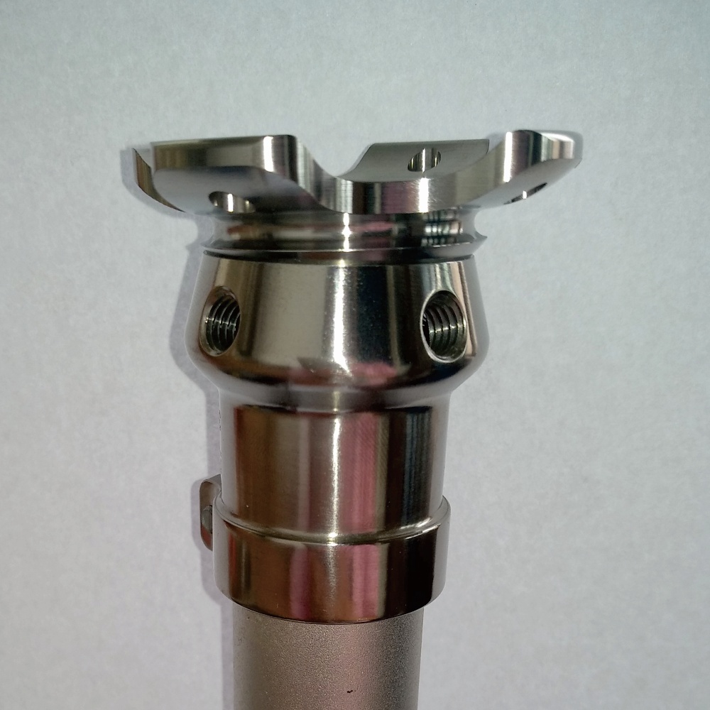 Titanium tube clamp adapter