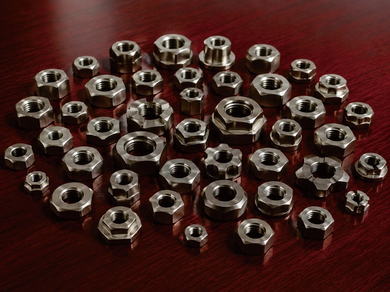Titanium hex nuts for corrosion resistant fastening