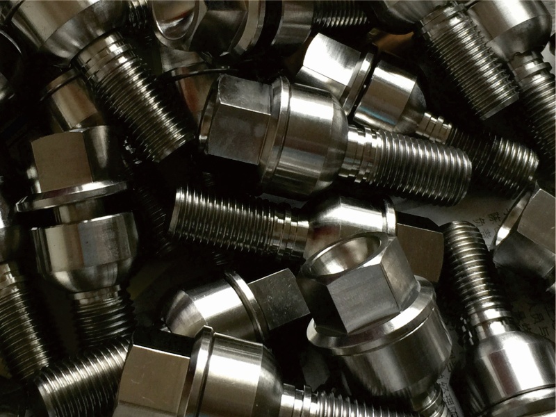 Titanium wheel lug bolts and rim bolts