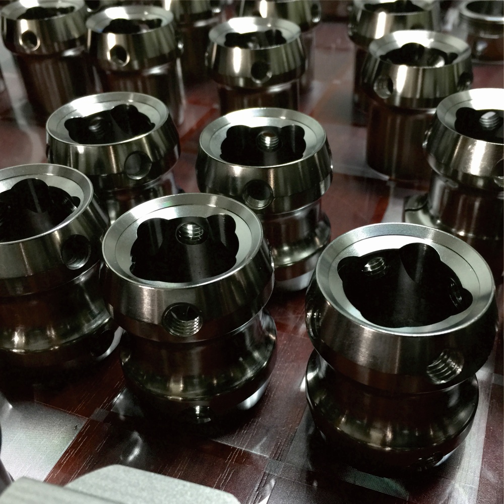 Double-ended adapter for prosthetic component assembly