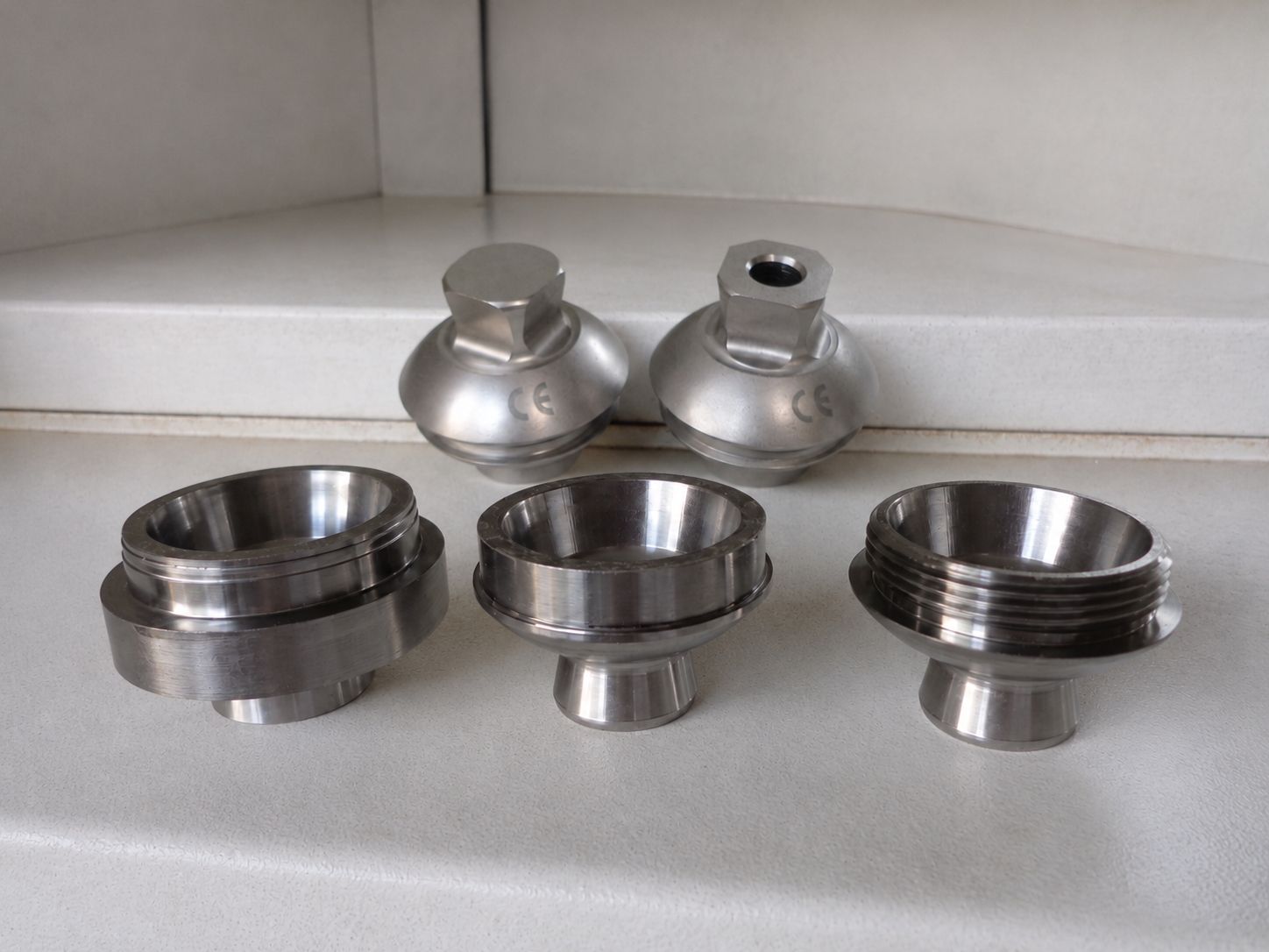 CNC machining and inspection of prosthetic pyramid receivers