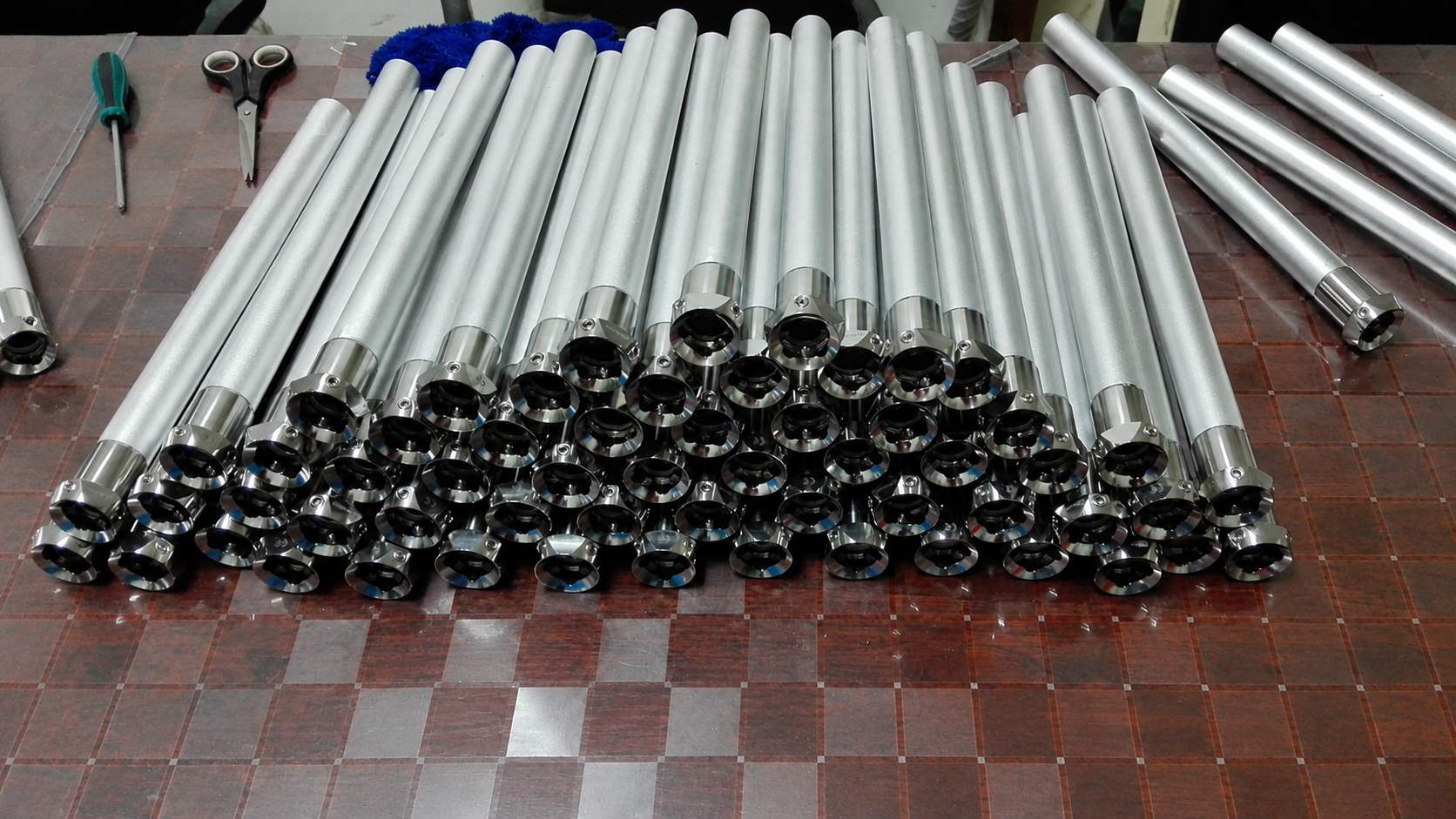 machining and inspection of titanium prosthetic pylon tubes