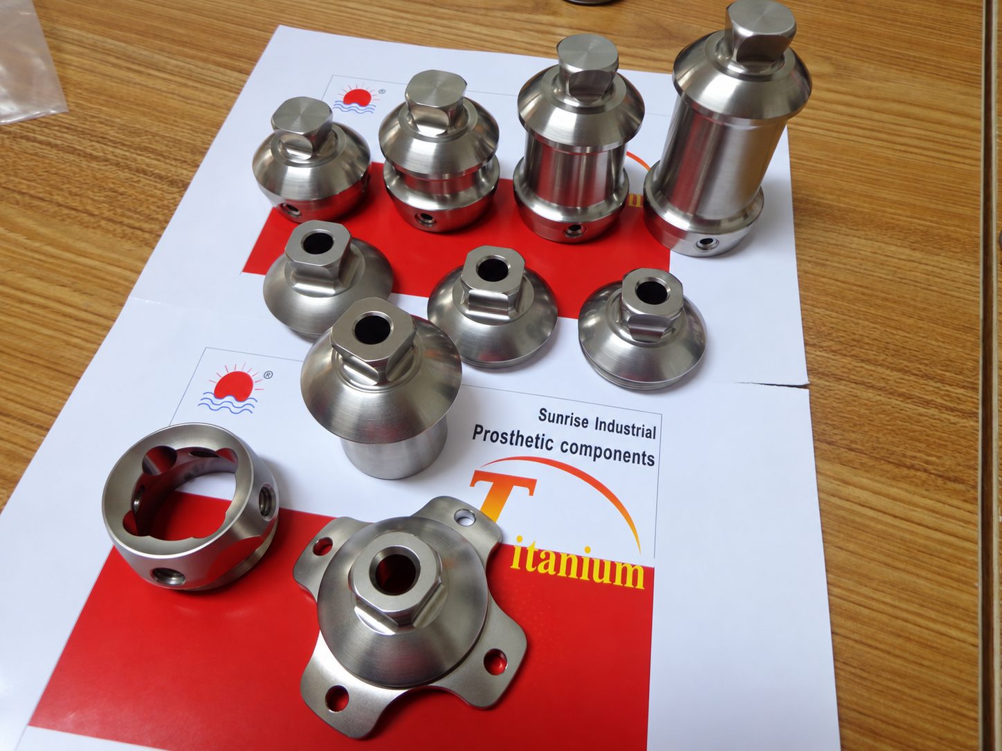 titanium prosthetic pyramid adapters for modular lower limb prosthetic systems