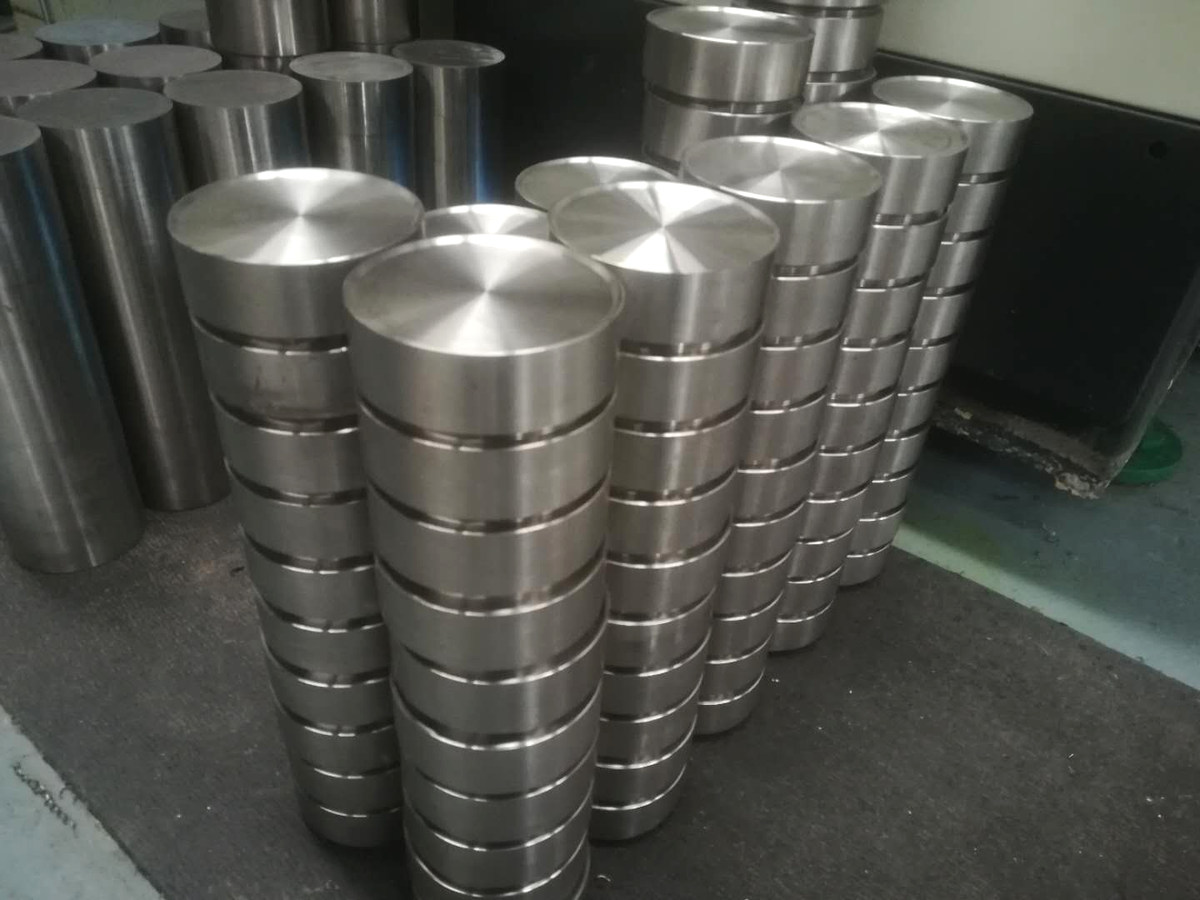 Batch of precision CNC machined titanium sputtering target discs with turned surfaces