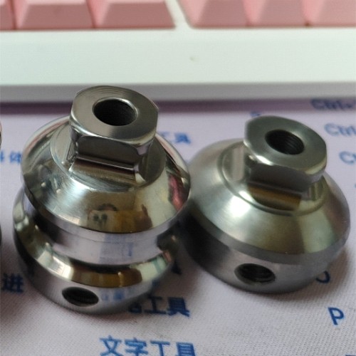 Double Ended Adapter with Pyramid and Central Hole