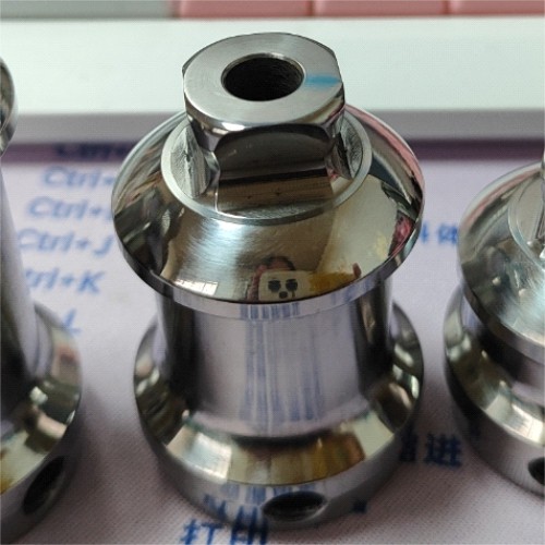 Double Ended Adapter with Pyramid and Central Hole