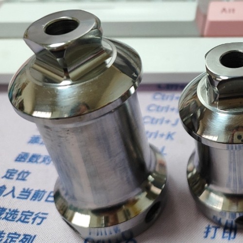 Double Ended Adapter with Pyramid and Central Hole